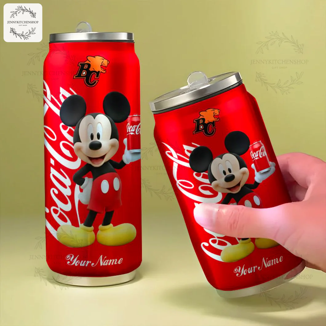 BC Lions Mickey Coca-Cola Tumbler In Hand for Scale A person holding the BC Lions Mickey Mouse Coca-Cola tumbler to show its size, next to another tumbler standing upright.