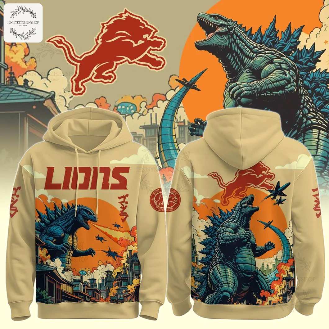 Beige hoodie featuring Detroit Lions x Godzilla graphic on the front: bold red "LIONS" text, a blue Godzilla, orange sunset, and a cityscape.