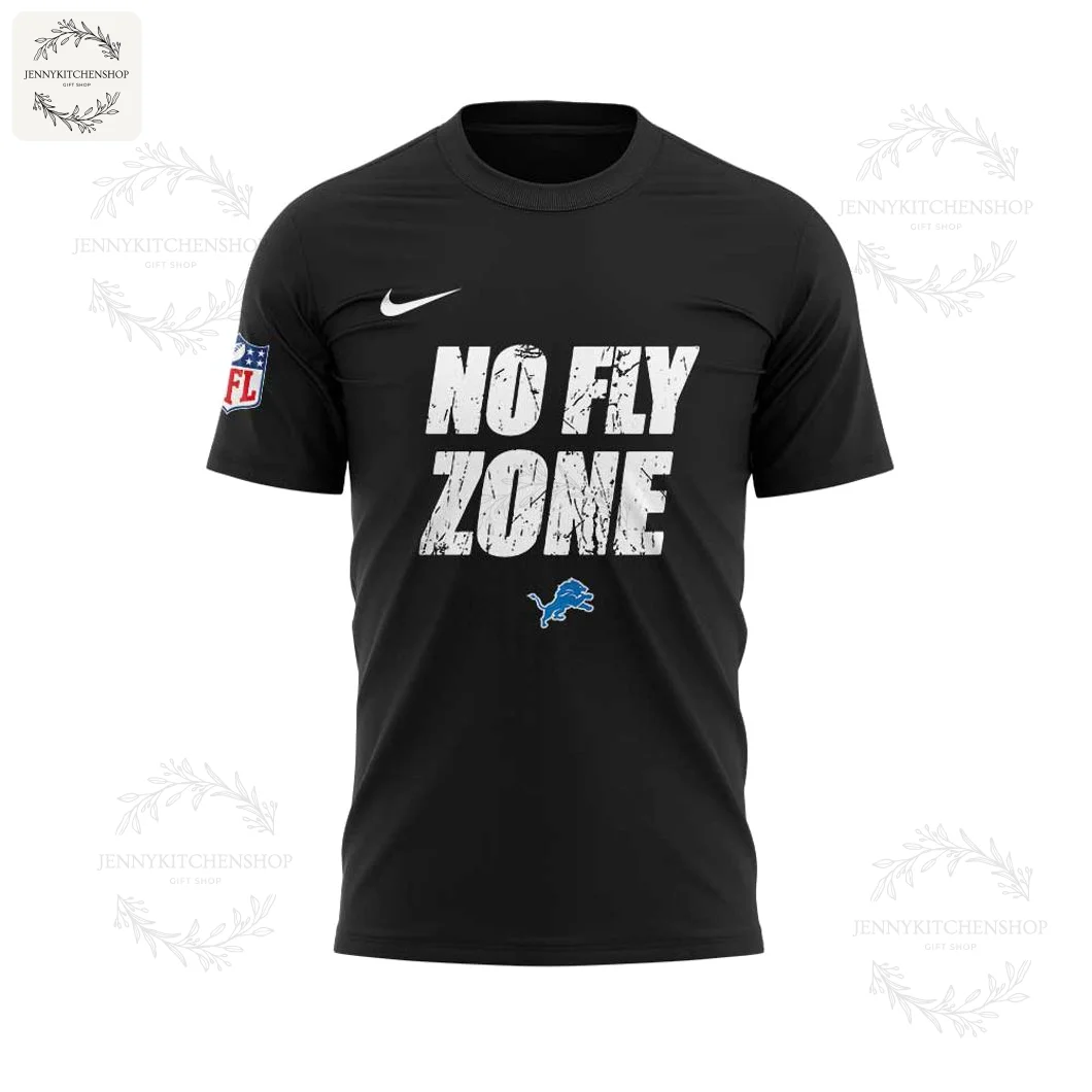 A front view of the black Detroit Lions t-shirt with NO FLY ZONE in a distressed white font and the team logo underneath.