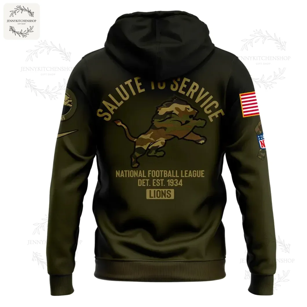 Back View of the Detroit Lions 2025 Salute to Service Hoodie Back of the Detroit Lions Salute to Service hoodie featuring the 'Salute to Service' text and camo lion logo over NFL details.