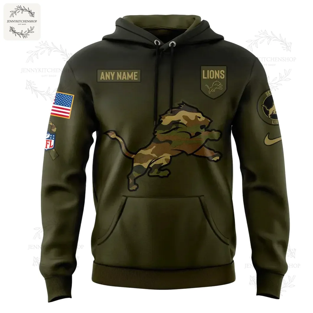 Front of the custom Detroit Lions Salute to Service hoodie showing the camo lion logo, American flag patch, and custom name area.
