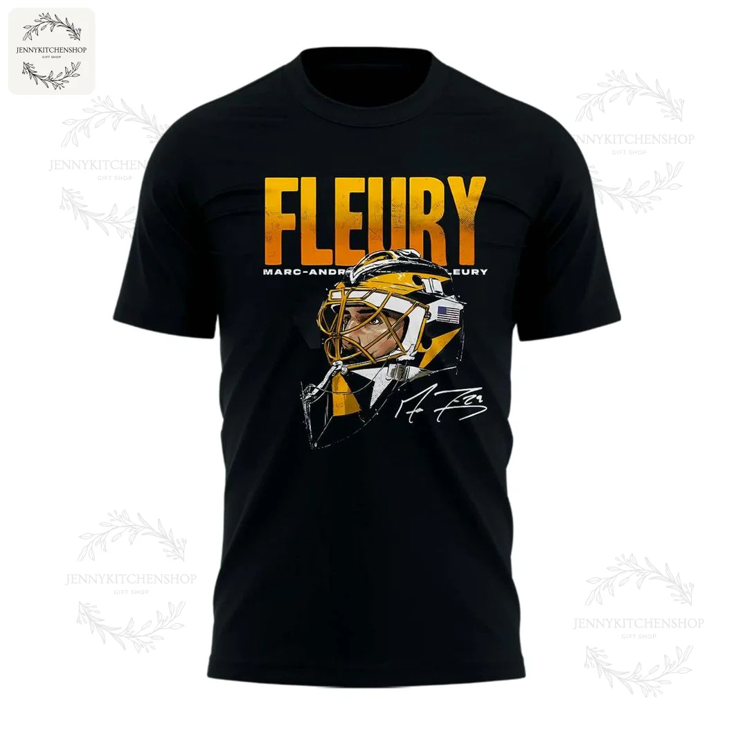 Front view — FLEURY helmet portrait and signature Front view of a black t-shirt with large yellow "FLEURY" text above a detailed portrait of a goalie mask and an illustrated signature accent.