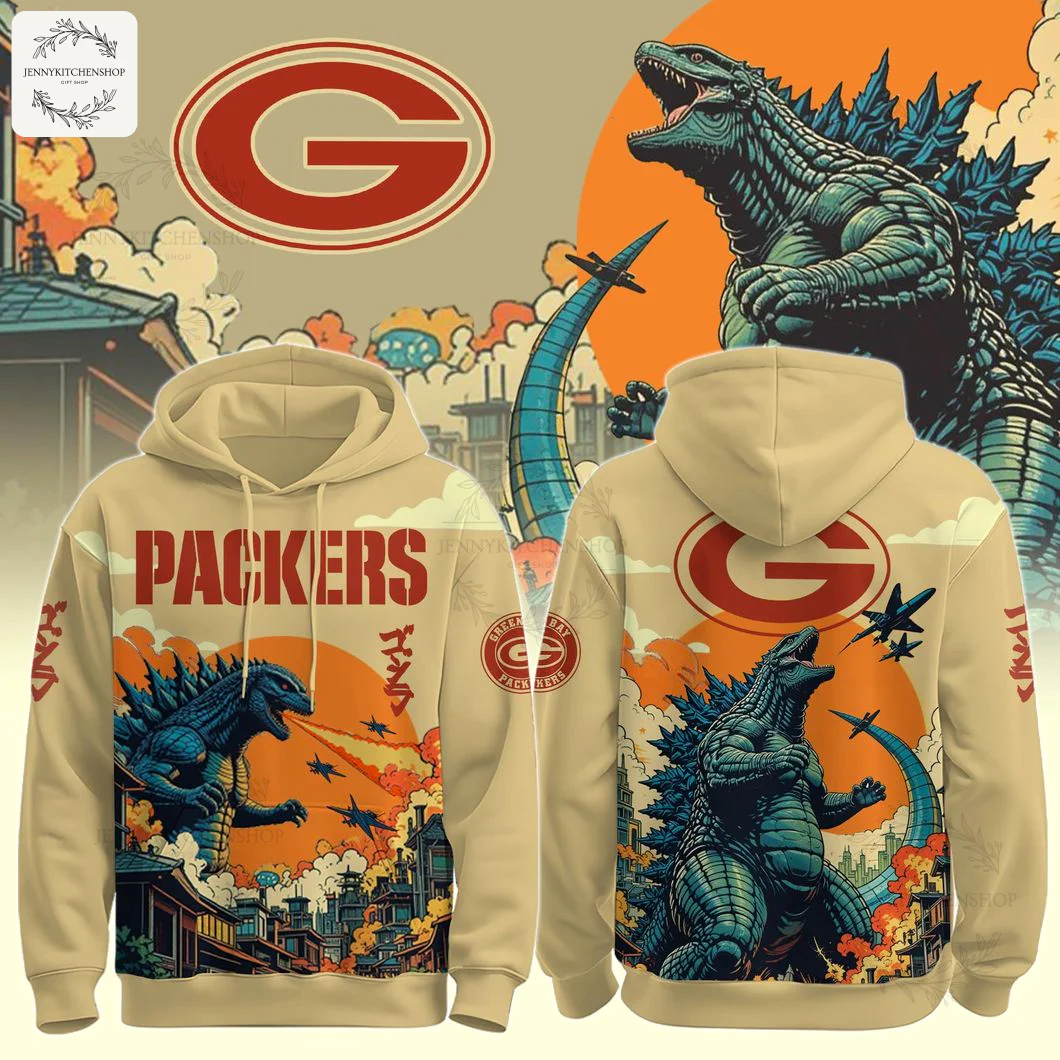 A tan hoodie showing the front and back, featuring a Green Bay Packers and Godzilla crossover design with Japanese-style artwork.