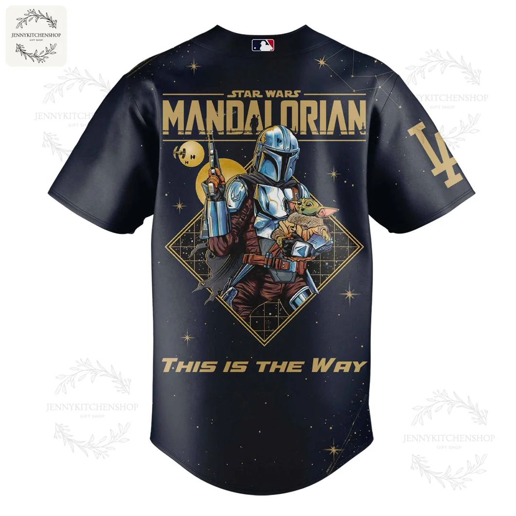 Back View of the LA Dodgers Mandalorian Grogu Jersey Back of the LA Dodgers x Mandalorian baseball jersey featuring a large graphic of Mando holding Grogu and "This Is The Way".