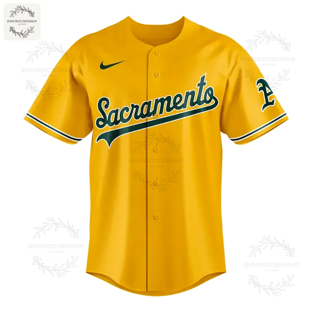 Front of the Oakland Athletics gold baseball jersey featuring "Sacramento" in green script, the Nike swoosh, and an A's sleeve logo.