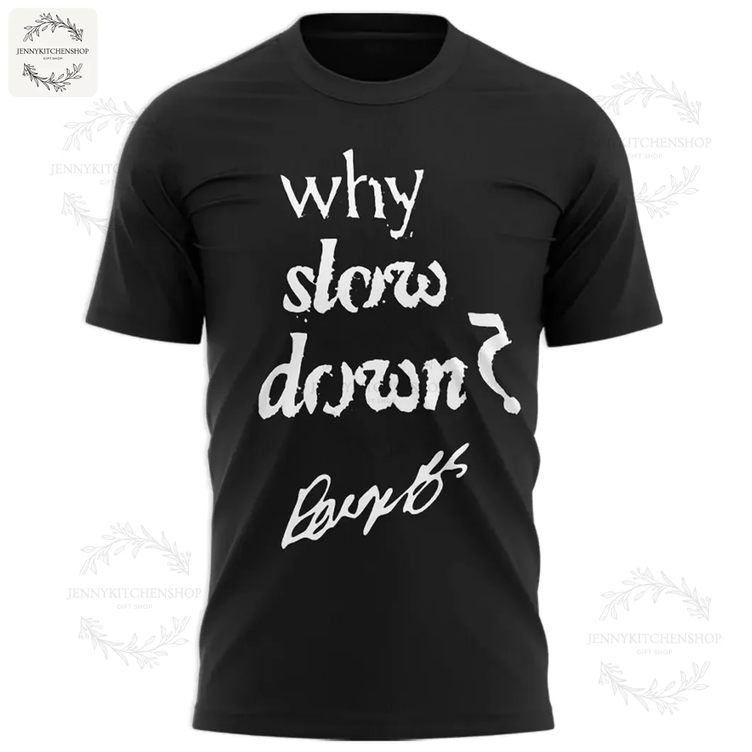 A mockup of the front of the Paige Bueckers black t-shirt featuring the text "why slow down?" and her signature in white.