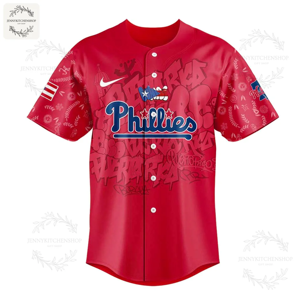 Close-up front view of the red Phillies Puerto Rican Heritage jersey showing the script logo with a flag character and graffiti details.