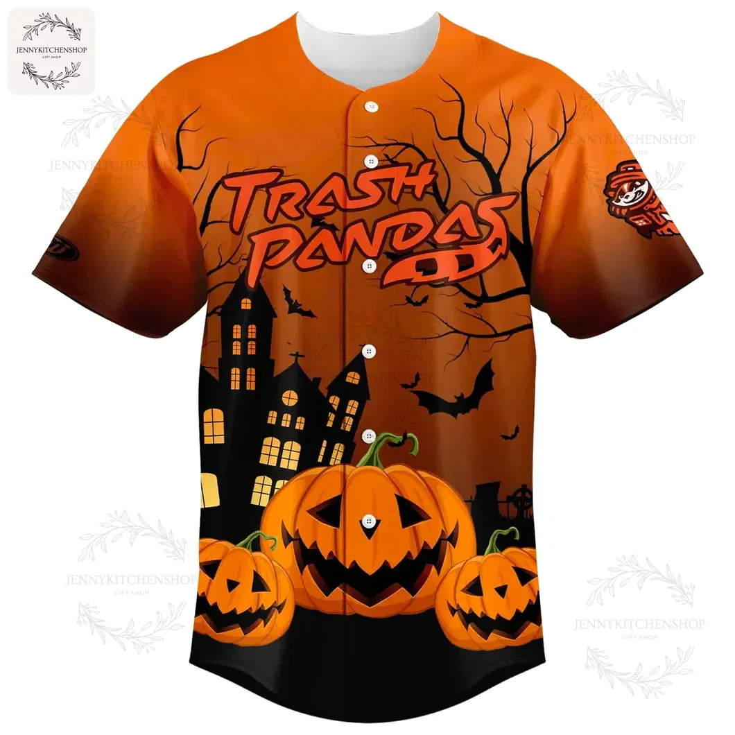 Front of the orange Rocket City Trash Pandas Fall Festival jersey with a haunted house, pumpkins, and spooky text.