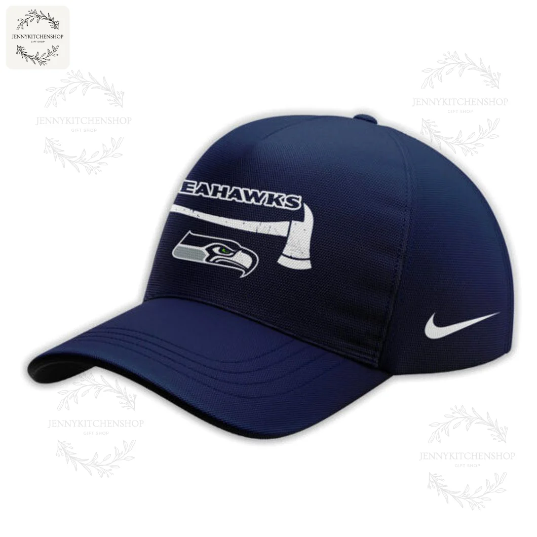 A navy blue Seattle Seahawks cap featuring the firefighter appreciation axe logo on the front and a white Nike swoosh on the side.