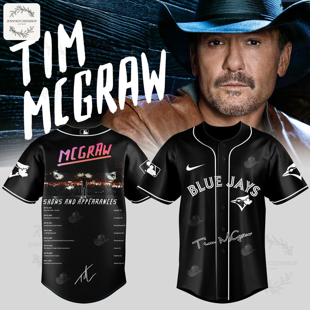 Front and back of the black Toronto Blue Jays Tim McGraw jersey. The front has the team logo and the back lists concert tour dates.