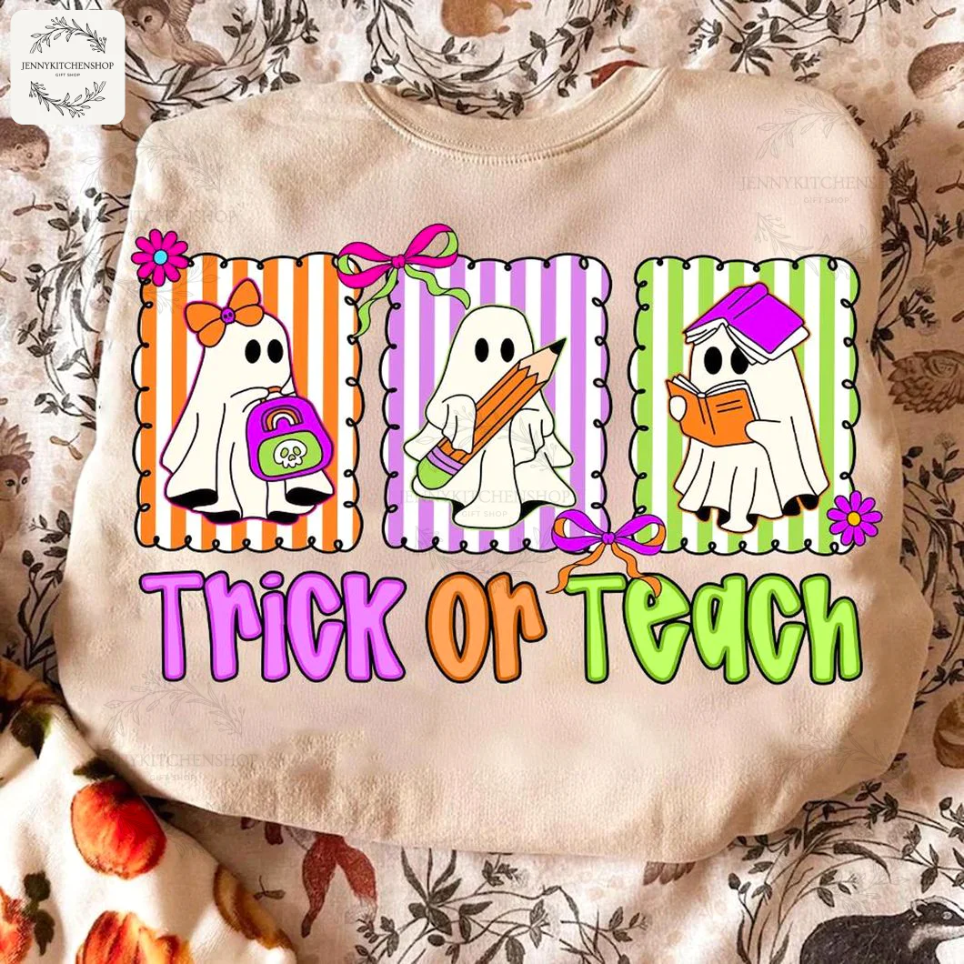 A cream-colored sweatshirt with a cute Halloween design of three ghosts representing teachers and the text "Trick Or Teach".