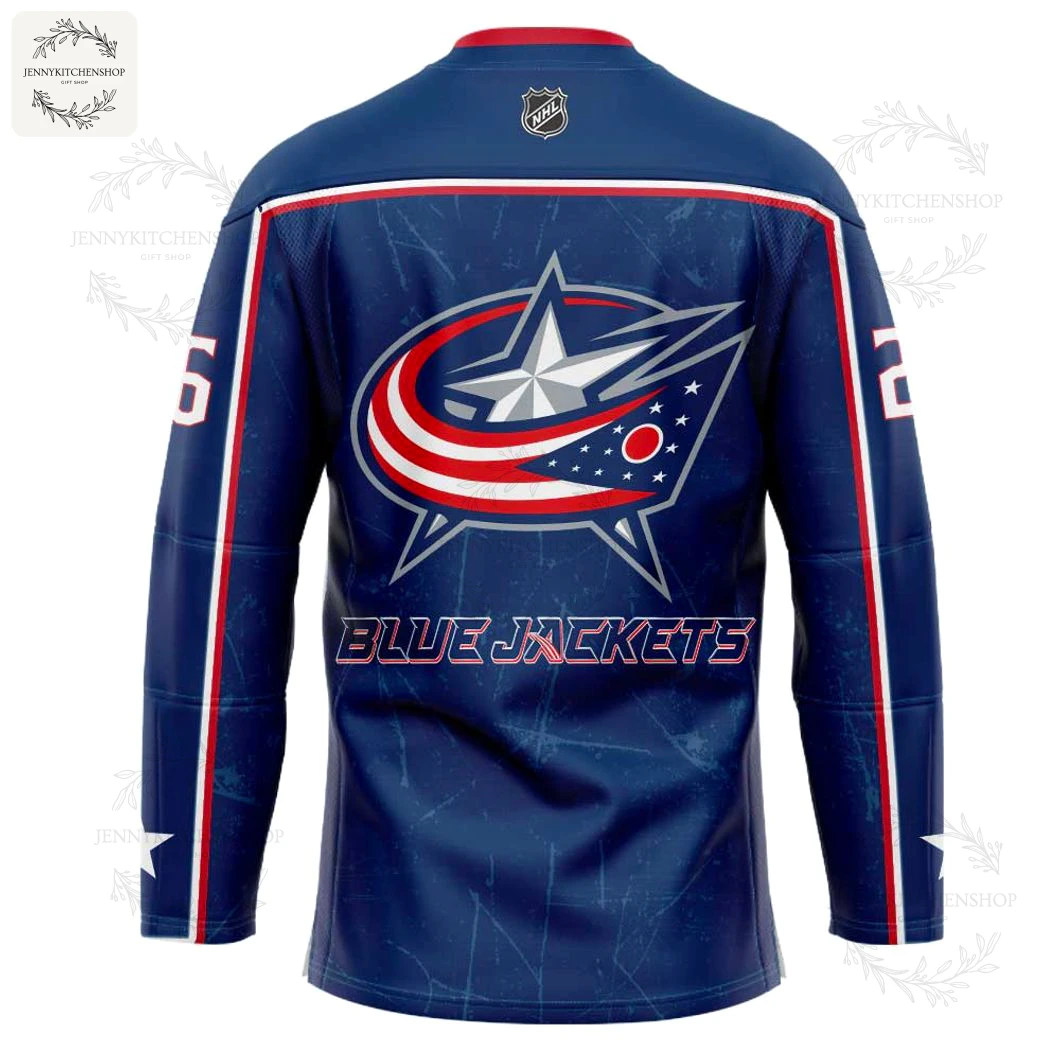 Back View of the Columbus Blue Jackets Superman 2026 Hockey Jersey Close-up of the back of the Columbus Blue Jackets Superman jersey, displaying the team's star logo and the name BLUE JACKETS.