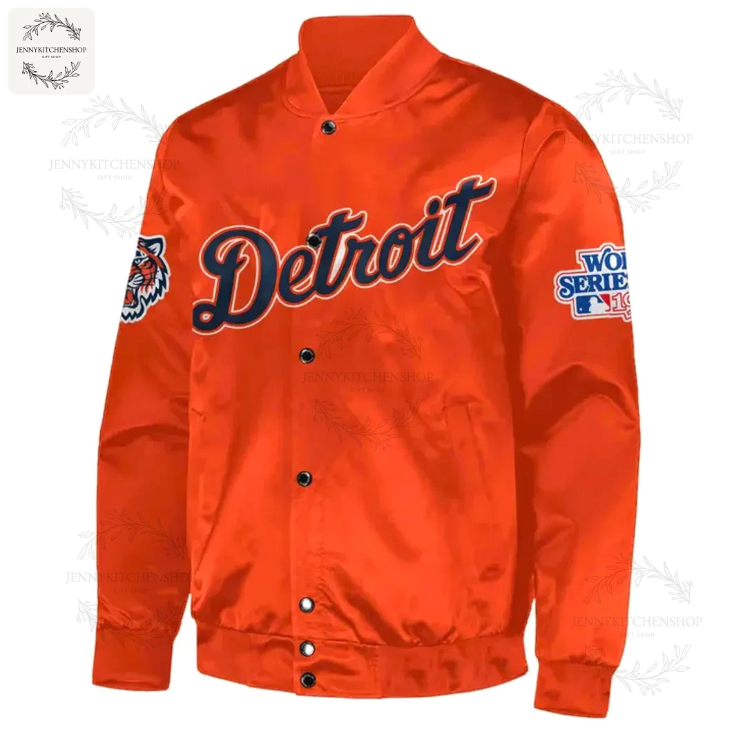 Front of the orange Detroit Tigers baseball jacket with a script "Detroit" logo, snap buttons, and World Series sleeve patch.