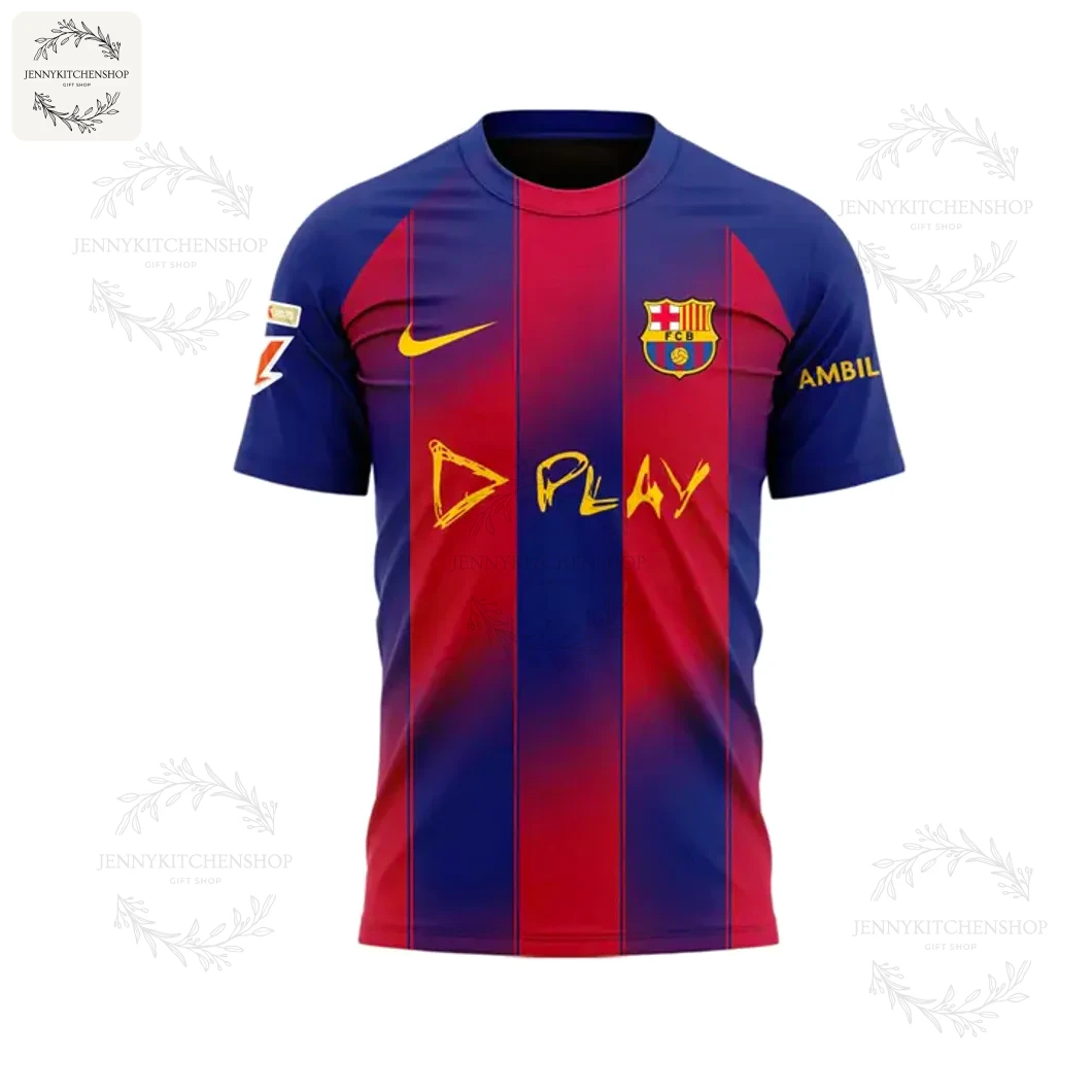 The front of the FC Barcelona x Ed Sheeran Play t-shirt, featuring the club crest, Nike logo, and "Play" sponsor in yellow.