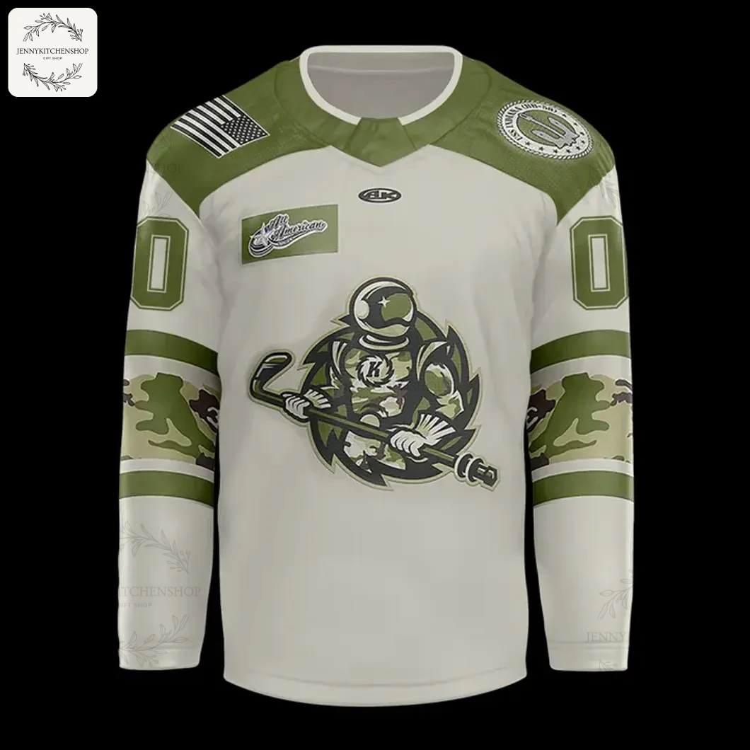 Close-up of the front of the Fort Wayne Komets Military Appreciation jersey, showing the astronaut crest and camo sleeves.