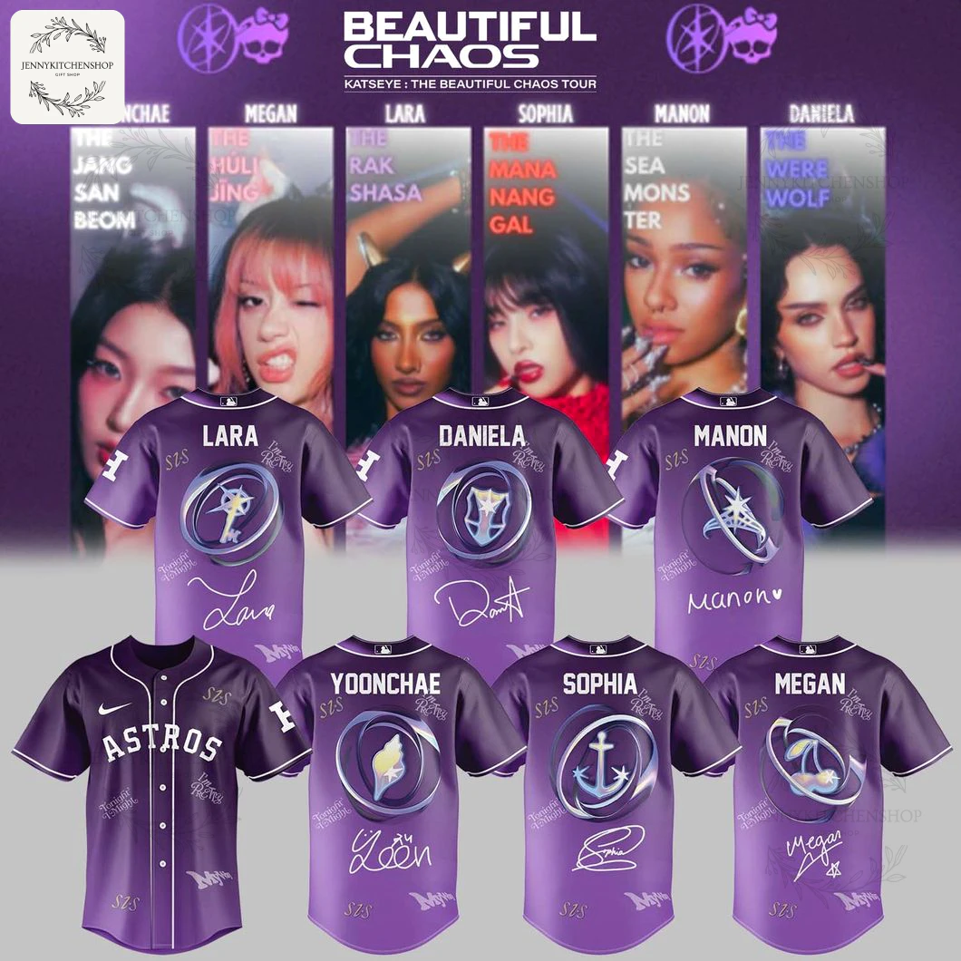 Front view of purple Houston Astros x KATSEYE baseball jerseys with white "ASTROS" wordmark, Nike swoosh, button-up styling and printed artist signatures, displayed against a tour poster backdrop.