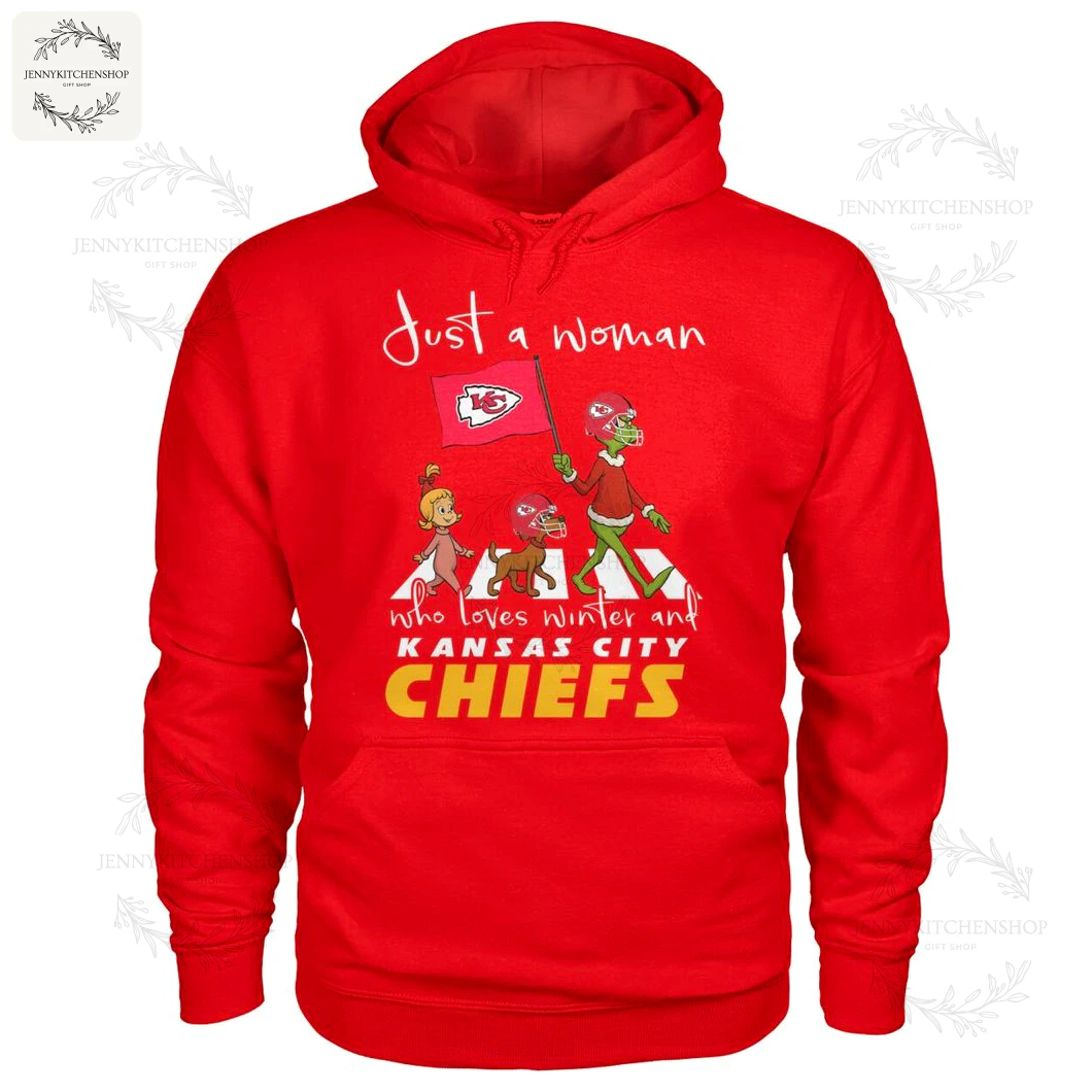 A red hooded sweatshirt for women featuring the "Just a Woman who loves winter and Kansas City Chiefs" Grinch-themed design.