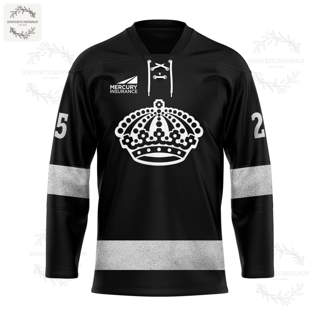 Front of the black Los Angeles Kings Our Crown 2025 hockey jersey, featuring the white crown crest and silver stripes.