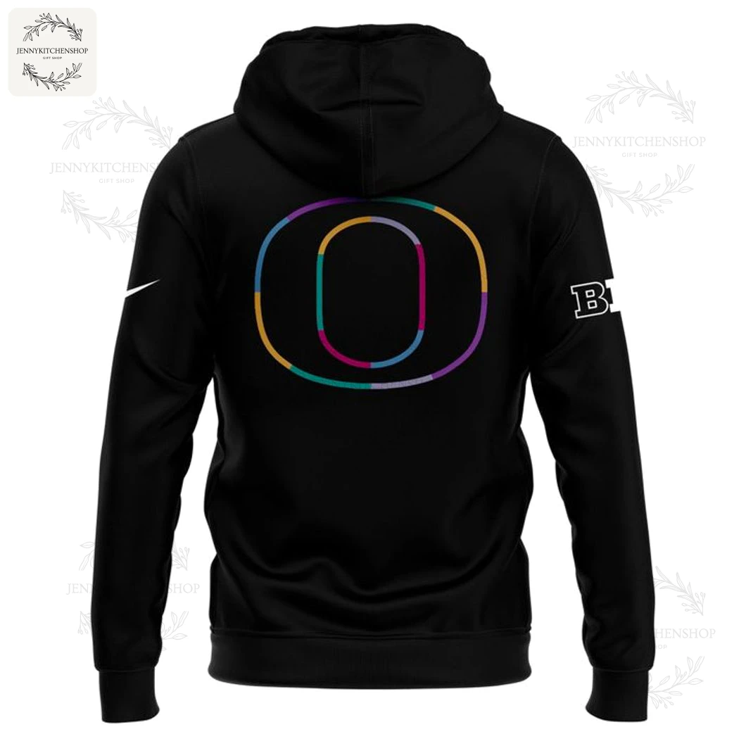 Back of the black Oregon Ducks Crucial Catch hoodie featuring a large, multi-colored 'O' logo and B1G conference logo on the sleeve.