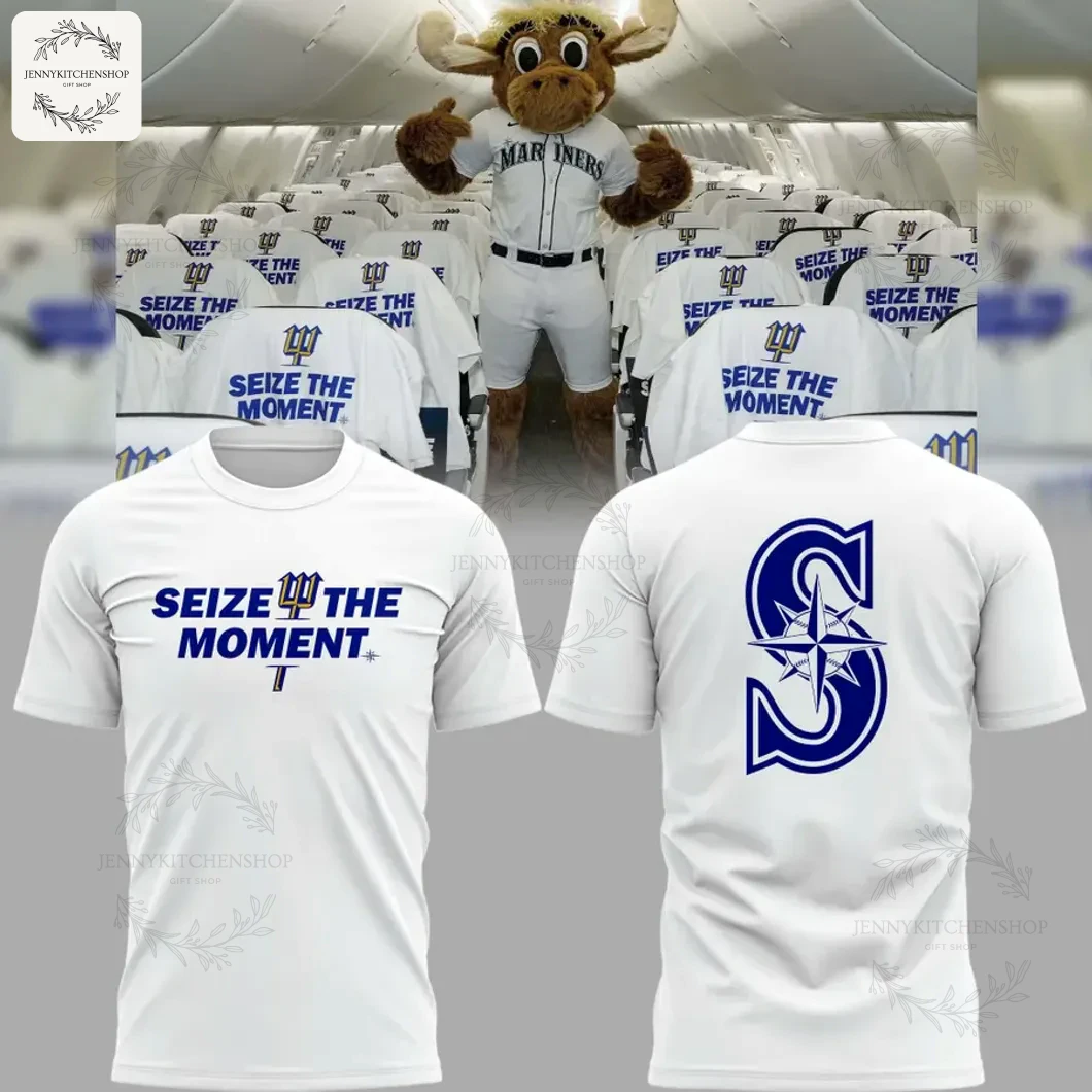 Front and back view of the white Seattle Mariners t-shirt with Mariner Moose and team plane in the background.