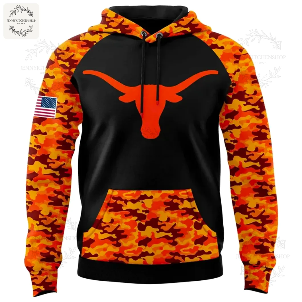 Front of the Texas Longhorns 2025 Salute To Service hoodie featuring the Longhorn logo on a black chest and orange camo sleeves.