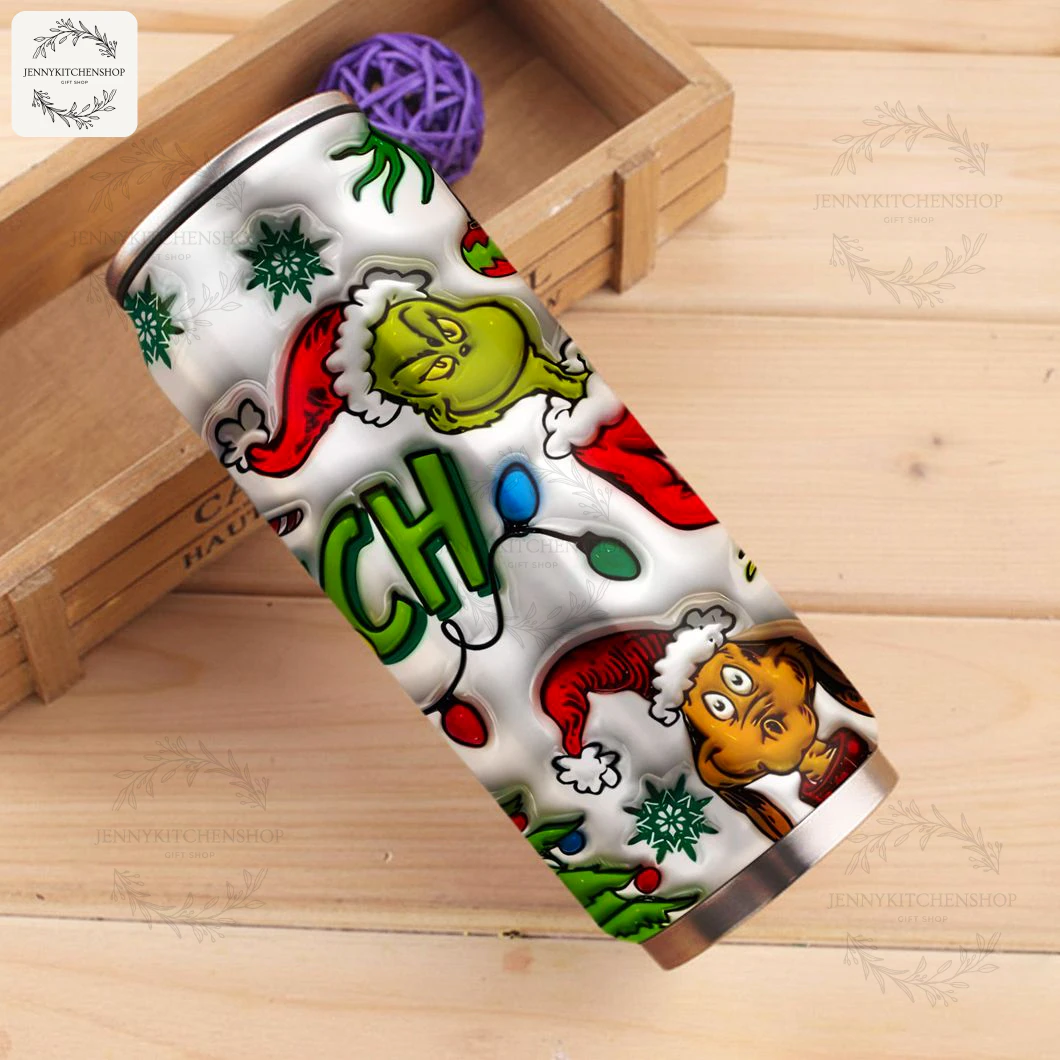 The Grinch Christmas Can Tumbler in a Rustic Setting The Grinch can shaped tumbler resting in a wooden crate, showcasing the festive character design with the Grinch and his dog Max.