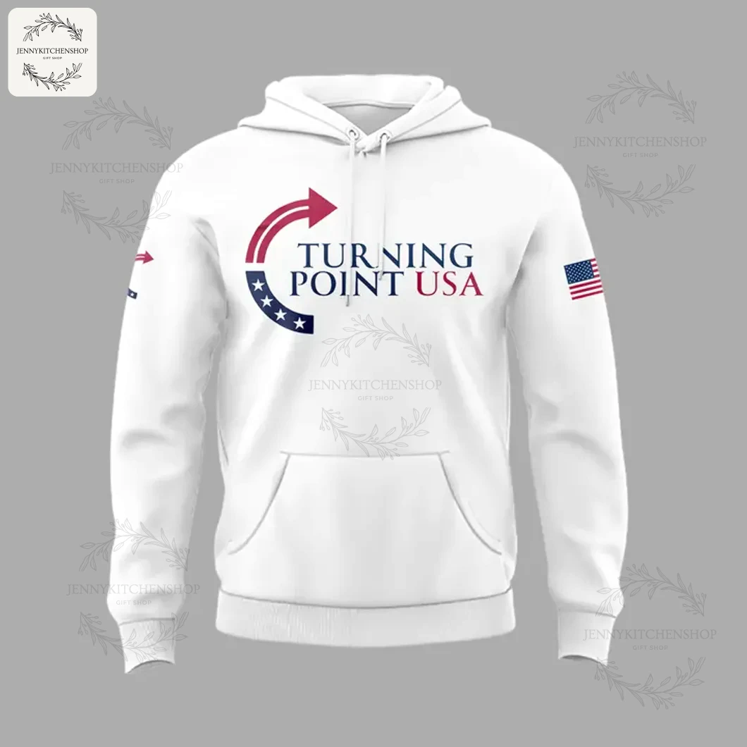 Front of the white hoodie showing the Turning Point USA logo on the chest and an American flag patch on the left sleeve.