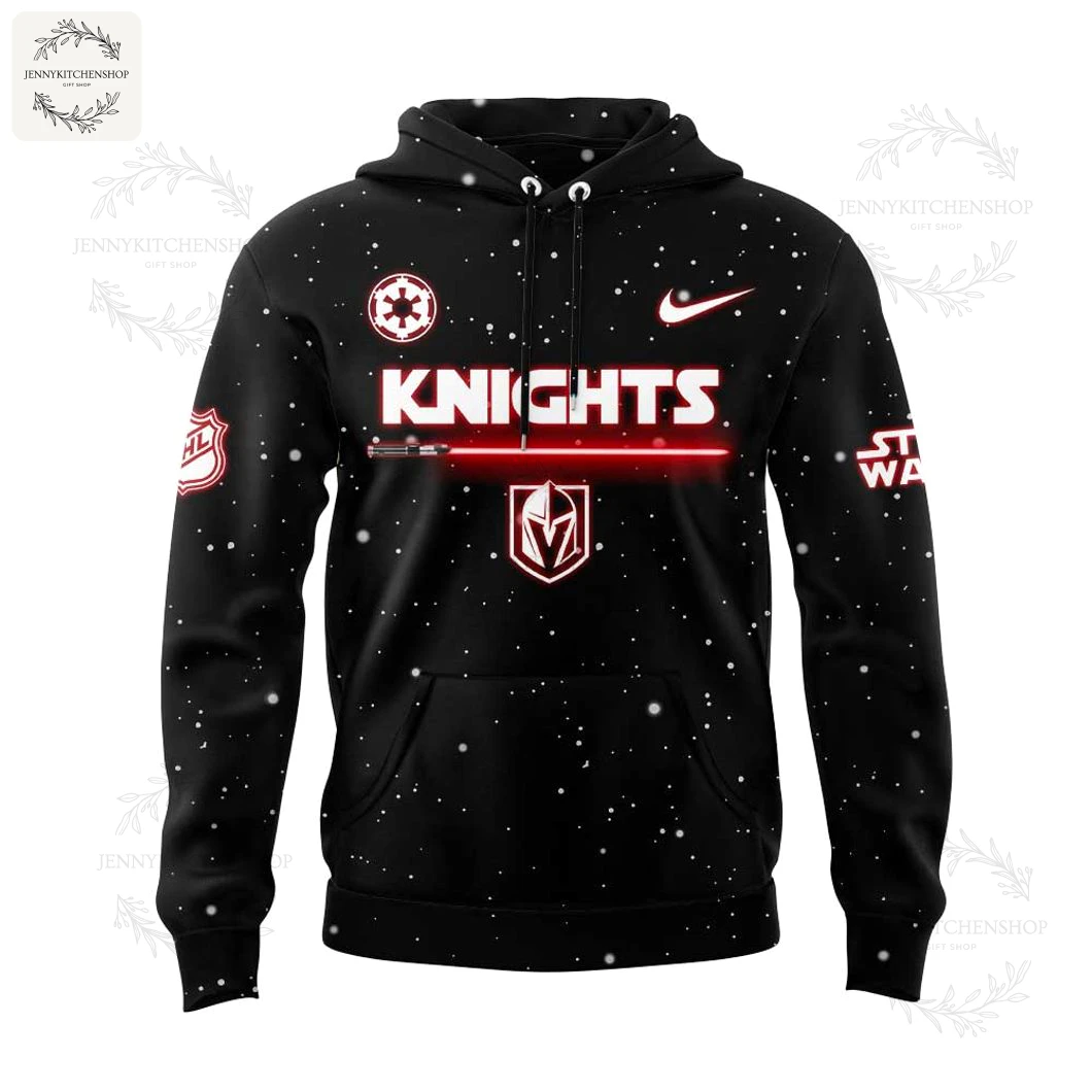 Front of the black Vegas Golden Knights Star Wars hoodie featuring a red lightsaber graphic and the team crest on a starfield background.